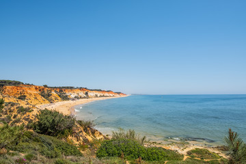 Fototapeta na wymiar The beach Praia da Falesia in Algarve of south Portugal. With the famous sandstone rocks.