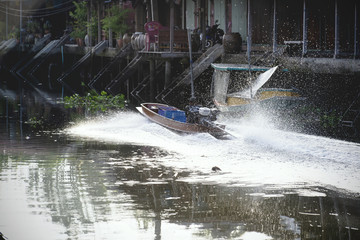 Fototapeta premium Speed boat in canal