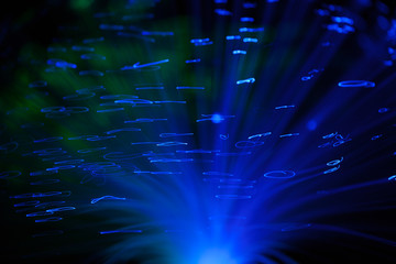 Abstract background a Optical fiber lamp. Closeup of colorful optical fibers
