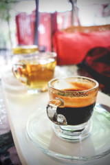 Cup of espresso and tea