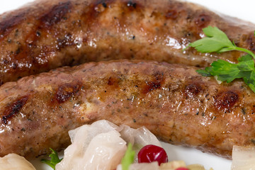 Grilled sausages with sauerkraut.