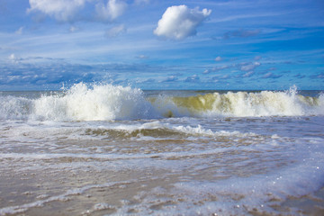 sea waves beating against the shore
