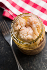 Pickled cauliflower in jar.