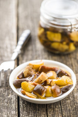 Pickled mushrooms. Marinated boletus.
