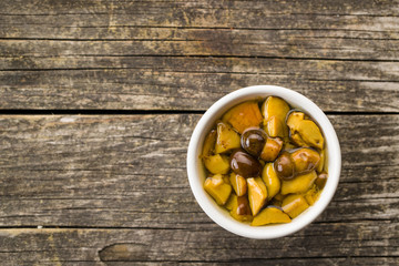 Pickled mushrooms. Marinated boletus.
