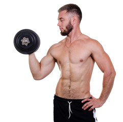 Fototapeta na wymiar adult man with a beard athlete or bodybuilder lifts a heavy dumbbell against a white background
