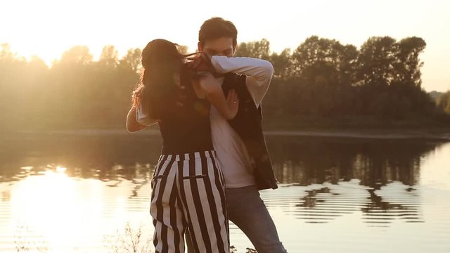 Two lovers dancers at sunset. Latin and social dances concept