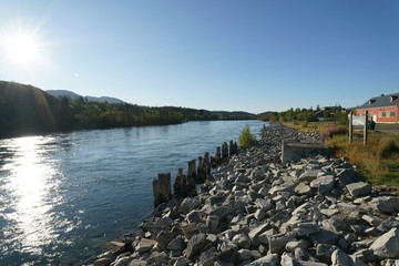 Fototapeta premium Whitehorse,Canada-September 10, 2018: Yukon River flowing in Whitehorse, Canada in September
