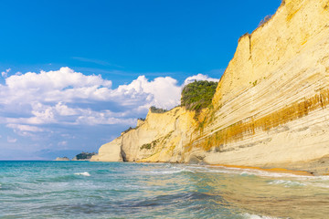 Logas Beach and amazing rocky cliff in Peroulades. Corfu Island. Greece