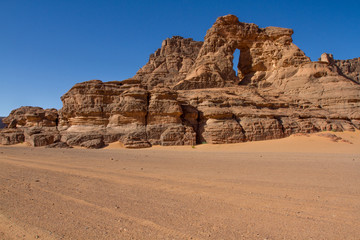 Fototapeta na wymiar Amazing rock formation in Tadrart Rouge. Tassili n’Ajjer National Park, Algeria 