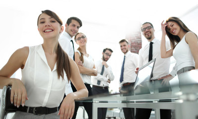 young employee on the background of a professional business team