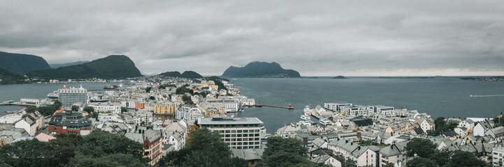 Panoramic view of the Norwegian town of Alesund during a cloudy day.