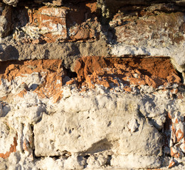 old brick on the fence close up