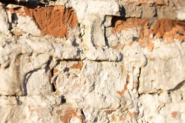 old brick on the fence close up