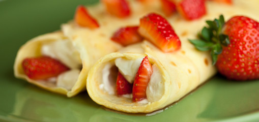 Strawberry crepes with whipped cream