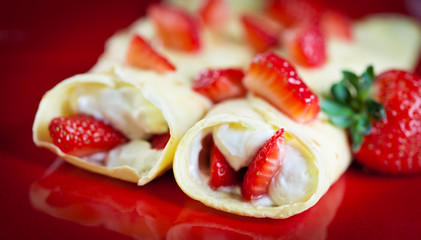 Strawberry crepes with whipped cream