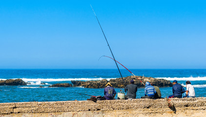 Fishermen at the port of Essaouira in Morocco