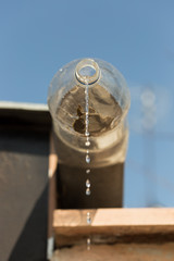 Dripping water from plastic bottles