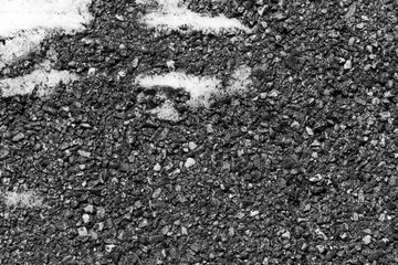 Remains of snow on the asphalt