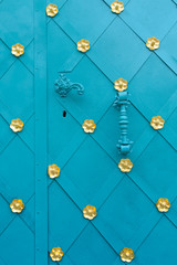 Decorated blue door of the Catholic church of Kahlenberg, Vienna