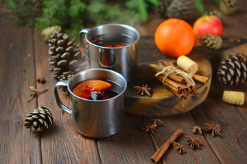 Rustic background with a mulled wine cups