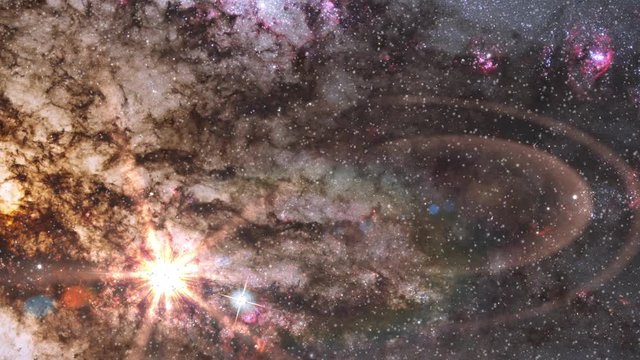 Centaurus galaxy active star nursery in outer space rotating with burst flare light. Contains public domain image by NASA