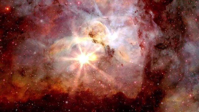Carina nebula in outer space rotating with burst flare light. Contains public domain image by NASA
