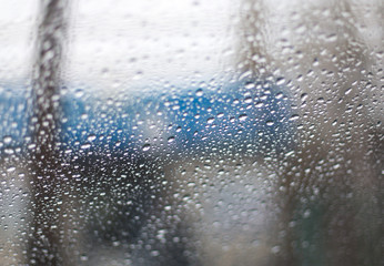 Naklejka na ściany i meble Raindrops on the windshield