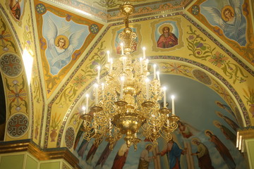 Chandelier lit at the solemn moment of worship.