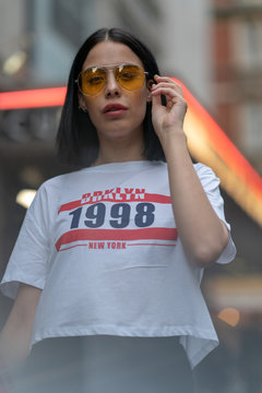 Portrait of brunette girl  and brooklyn 1998 t shirt