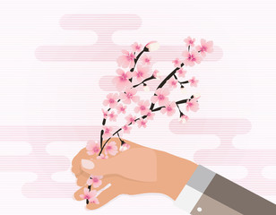 Obraz na płótnie Canvas Hand holding colorful branch of cherry blossoms. Vector Illustration