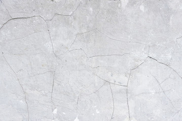 Concrete wall background with cracks