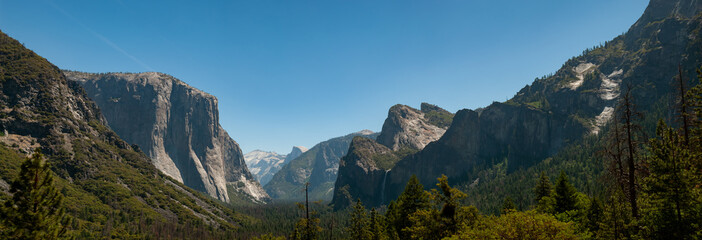 Fototapeta na wymiar A wide shot of some of the features in Yosemite, including El Capitan. California, June 2018