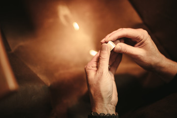 Hands of female jeweler making jewelry