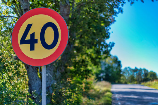Traffic sign in limiting the speed to 40 kph at the road