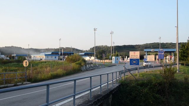 Border crossing and customs. Checkpoint for vehicles at Velika Kladusa, between Croatia and Bosnia and Herzegovina. Cars entering the EU crossing the border. Southeastern border of European Union