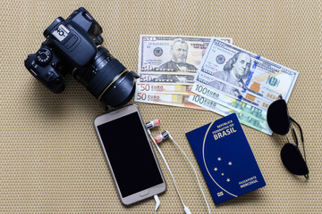 close up on Brazilian passport and travel items