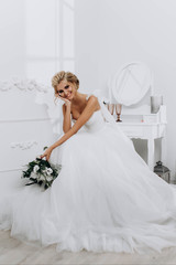 beautiful sexy young blond woman in bath with rose petals