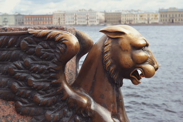 The sights of St. Petersburg on the University embankment - a griffin on the background of...