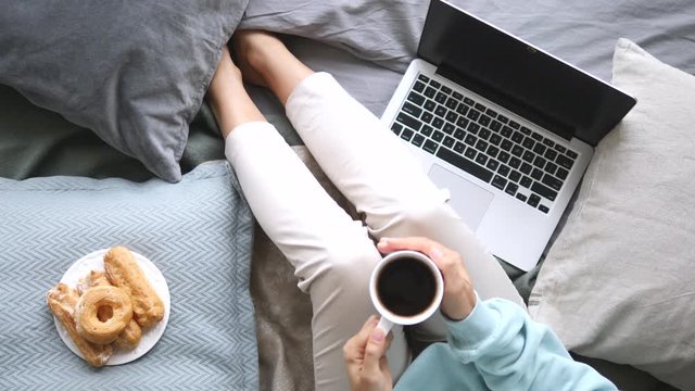 Trendy Top View Of Woman Legs, Laptop And Coffee Cup
