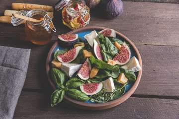 salad with green, figs, cheese vegetarian dish