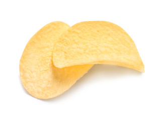 Tasty crispy potato chips on white background