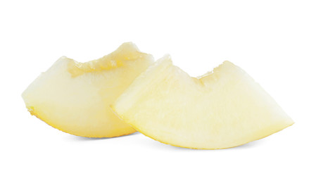 Slices of tasty ripe melon on white background