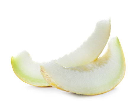Slices of tasty ripe melon on white background