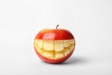 Funny smiling apple on white background © New Africa