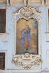 Painting of the Madonna in a piazza in Rome, Italy