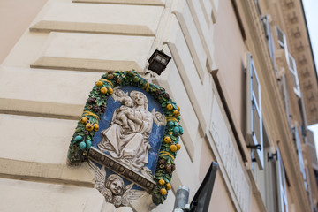 Madonna sculpture on a street corner in Rome, Italy