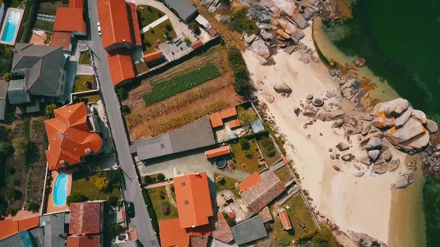 Aerial view of a coastal tiny village at Boiro bay, Galicia, Spain.