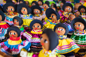 A group of colorful mexican dolls