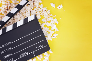 Tasty popcorn and clapboard
